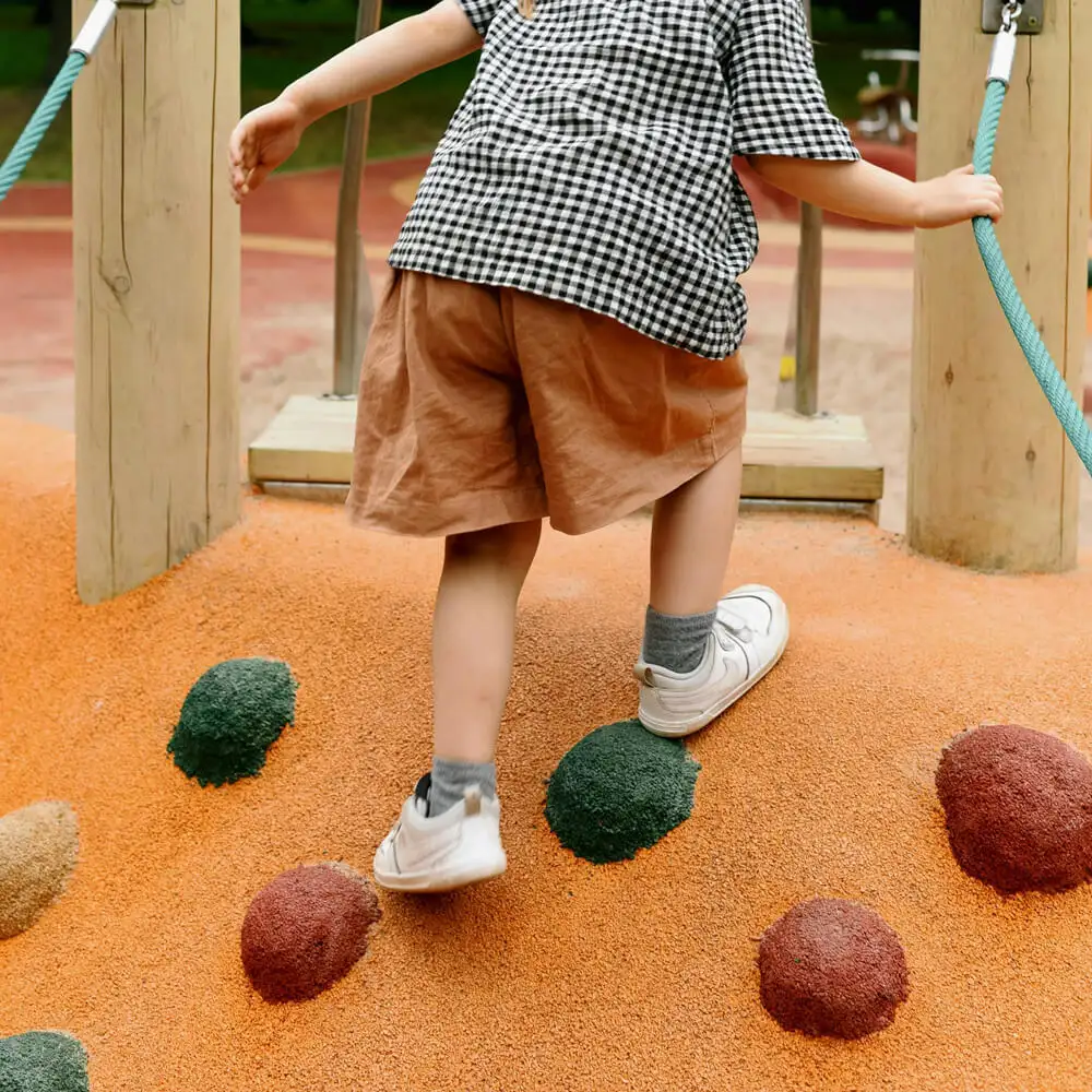 Kid playing in a park